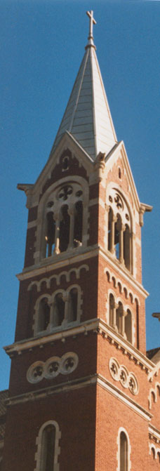 The towers of the neighborhood Catholic church dominate the skyline