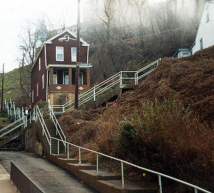 Intersection of two hillside streets.